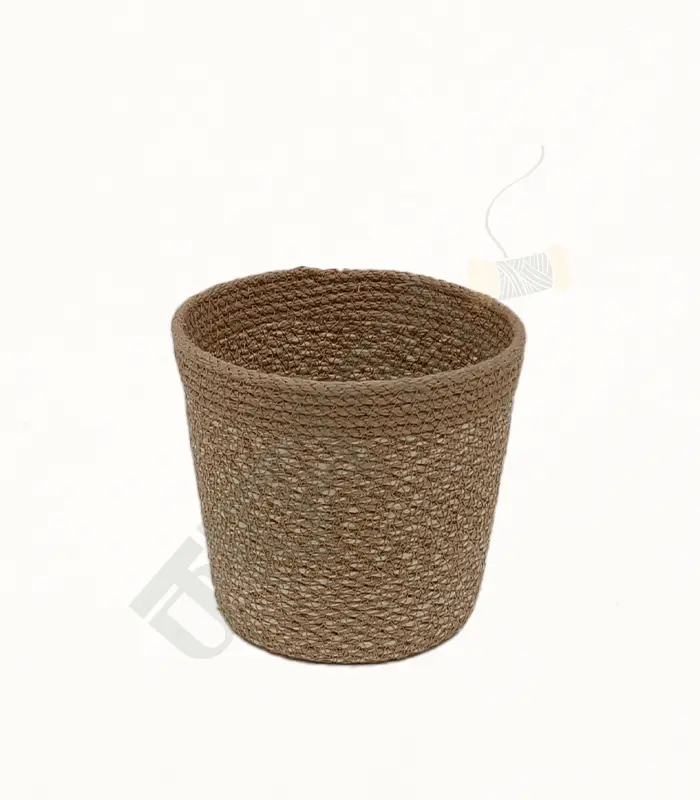 Jute Planter Natural jute planter for indoor and outdoor plants, featuring a simple and eco-friendly design.